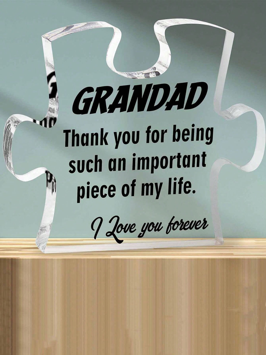Surprise Grandpa with a heartfelt gift! Our personalized acrylic puzzle plaque features a heartfelt message from his grandchild, making it a unique and meaningful gift. The puzzle piece design represents the special bond between a grandparent and grandchild. Show Grandpa your love with this personalized plaque.