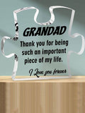 Surprise Grandpa with a heartfelt gift! Our personalized acrylic puzzle plaque features a heartfelt message from his grandchild, making it a unique and meaningful gift. The puzzle piece design represents the special bond between a grandparent and grandchild. Show Grandpa your love with this personalized plaque.