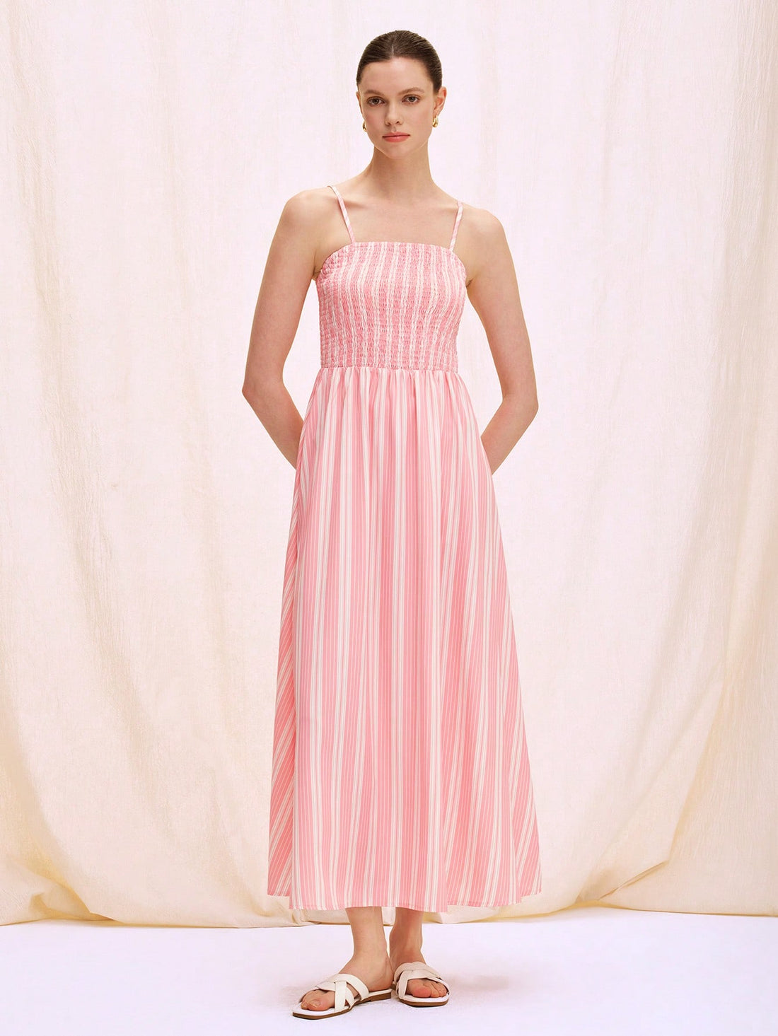 Step into vacation mode with this playful Pink Rayon Striped Front Knot Sling Dress. Lightweight and breezy, its soft rayon fabric keeps you cool while the front knot adds a cheeky twist to your casual look. Perfect for sunny beach days or relaxed brunches, this dress blends comfort with effortless style wherever your adventures take you.