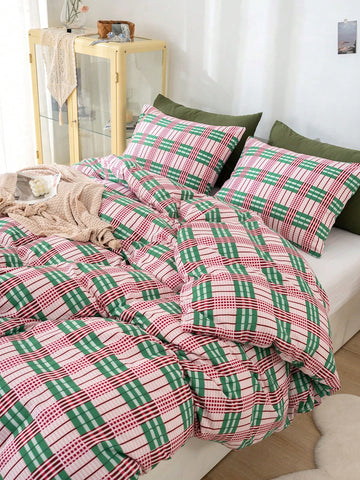 Upgrade your bedroom with our Pink and Green Geometric Plaid Bedding Set. Made with soft washed polyester fabric, this set is both comfortable and durable. The striking color combination adds a stylish touch to any bedroom decor. Experience the best of comfort and style with our bedding set.