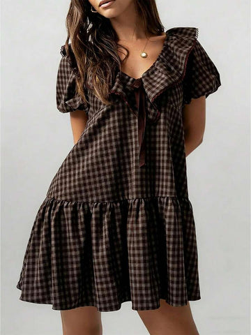 Front view of coffee plaid mini dress with ruffle collar and puff sleeves