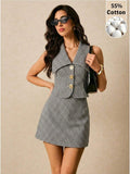 Front three-quarter view of black-and-white gingham vest and A-line mini skirt set with gold buttons