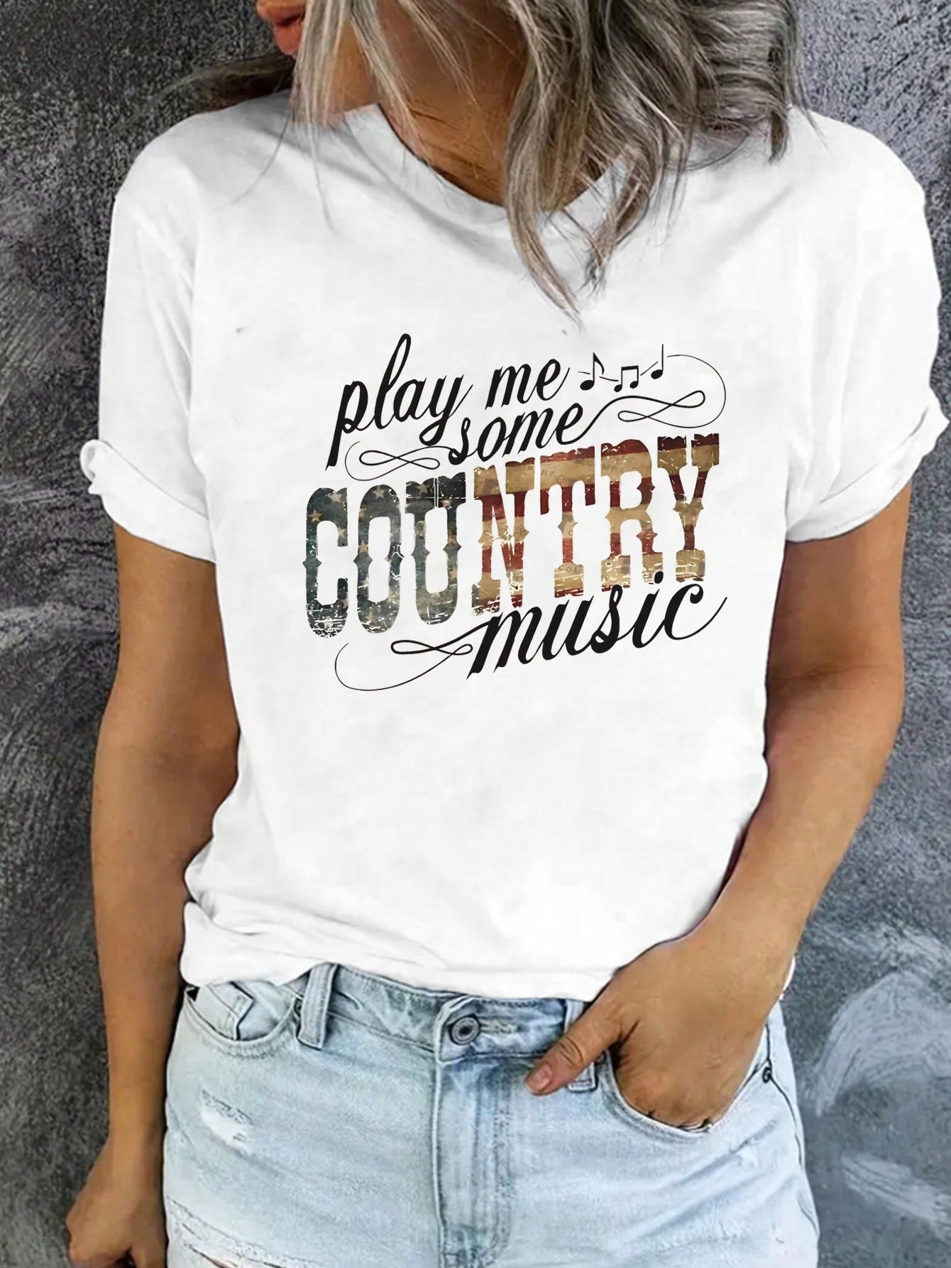 Get ready to two-step in this Play Me Some Country Music Graphic Tee. Featuring a casual crew neck and country-inspired design, this shirt is perfect for music lovers. Wear it to concerts or just around town and show off your love for all things country. (Yee-haw!)