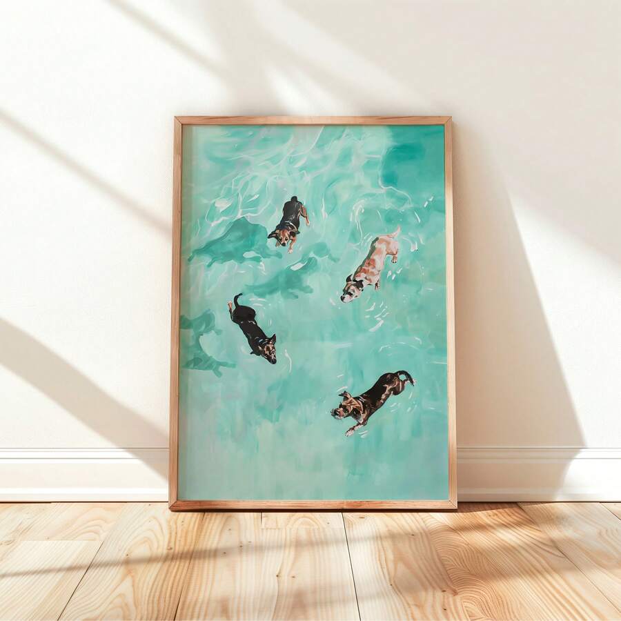 Framed dog swimming print leaning on white wall over wood floor