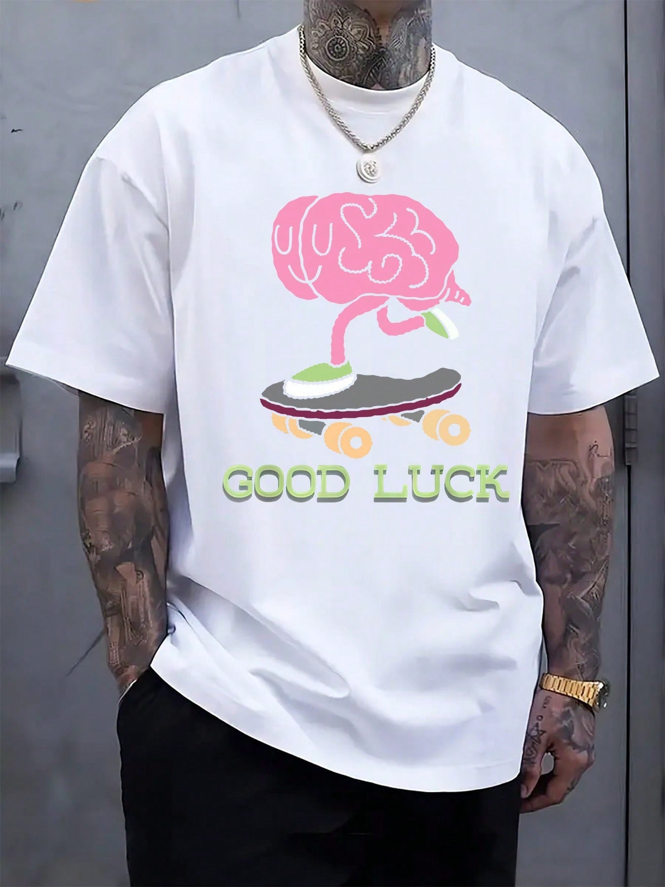 Get ready to turn heads this summer with our playful men's crew neck tee! Featuring a bold skateboard brain print in vibrant pink and green on sleek black fabric, this casual shirt brings fun and flair to your everyday look. Perfect for skate sessions or chilling with friends, it combines comfort and style effortlessly. Embrace the vibe and let your outfit do the talking!