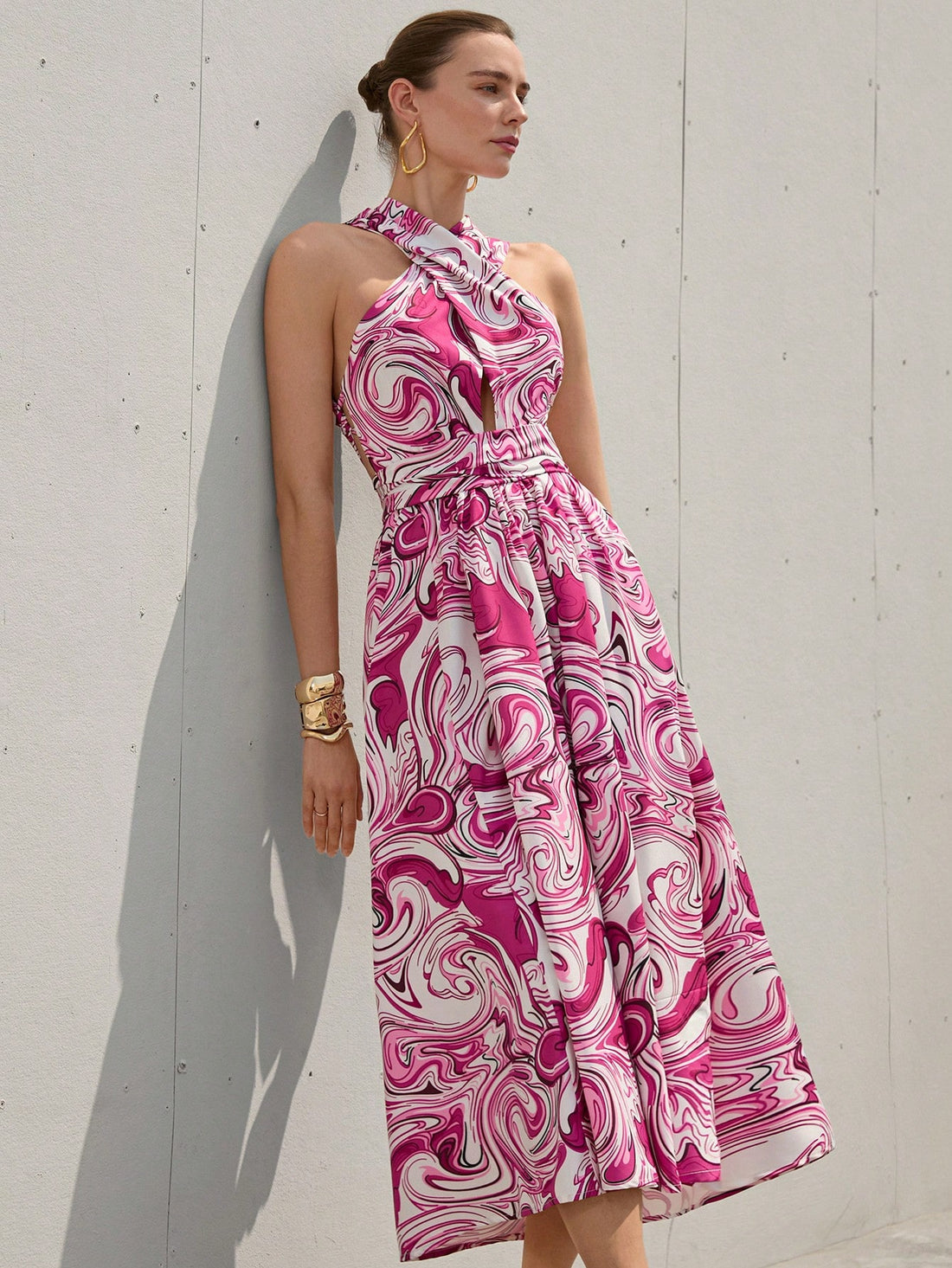 Step out in style with this playful pink and purple tie-dye backless dress. The halter neckline adds a flirty touch, perfect for casual days or chic evenings. Lightweight and breezy, it’s designed to keep you comfortable while turning heads wherever you go. Embrace fun fashion with a dress that’s as vibrant and lively as you are!