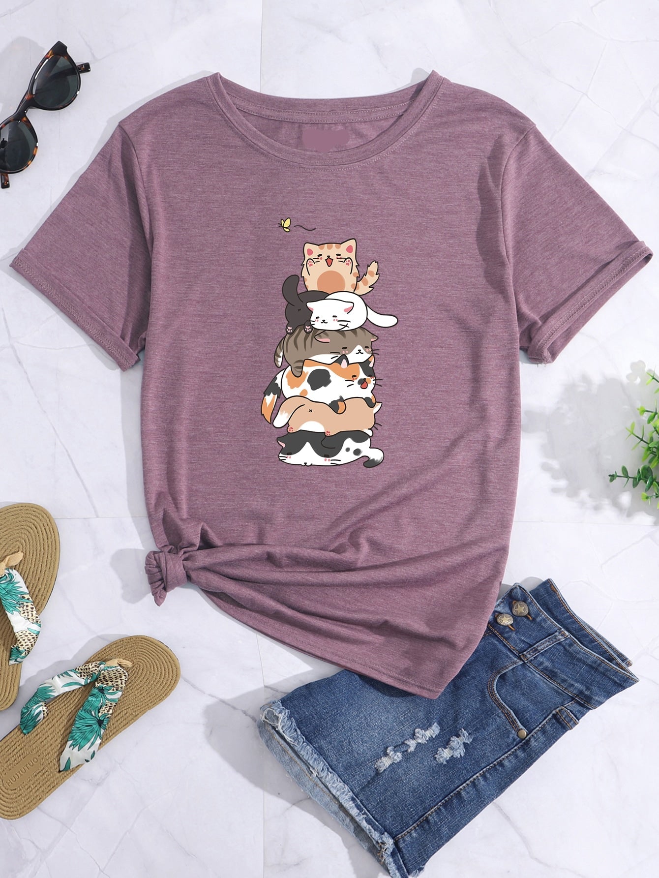 Get your paws on the Playful Purrfection tee! This adorable shirt features a cartoon cat graphic that will make you the talk of the town. Perfect for cat lovers, it's a purr-fect addition to your wardrobe. (Meow-gnificent bonus: it's super soft and comfy too!).