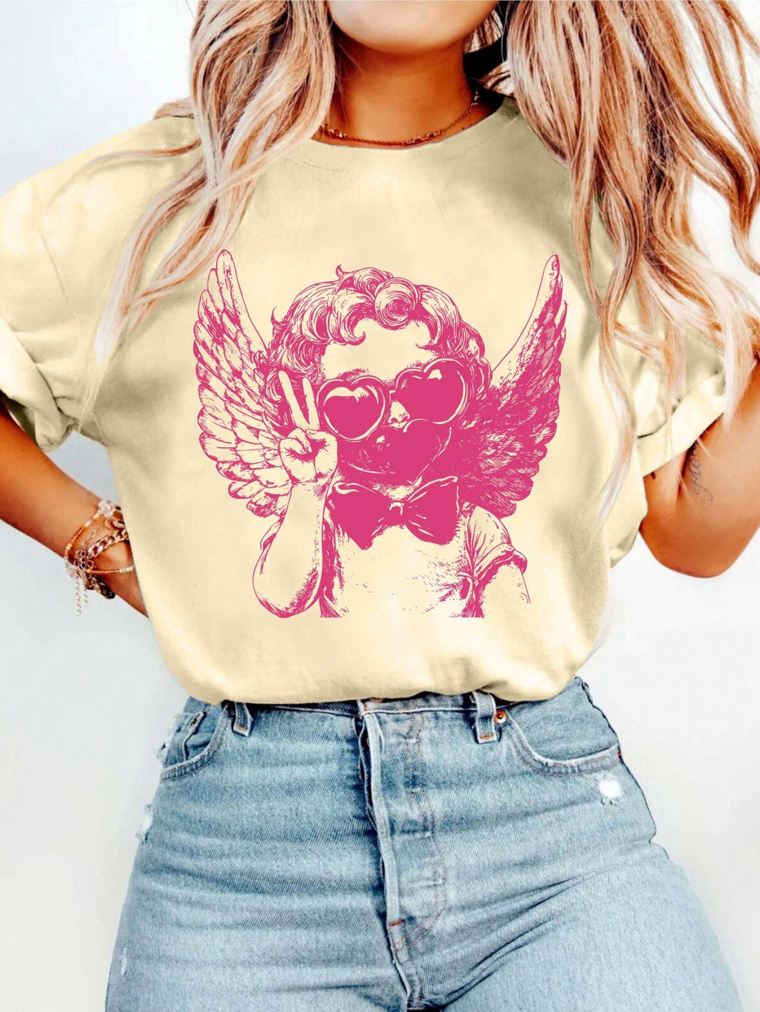 Shoot for the heart with our Playful Retro Cupid Bubble Print T-Shirt! Perfect for Valentine's Day, this quirky tee will have you spreading love and laughs. The retro design and playful print are sure to turn heads and make a statement. Love never looked so good (or fun)!