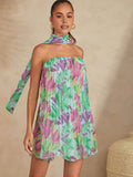 Wrap yourself in botanical bliss with this stunning pleated dress that's equal parts sophisticated and fun. The vibrant floral print brings life to any wardrobe, while the wrap neckline flatters every frame with effortless elegance. Pleated detailing adds movement and dimension, making this your go-to piece for everything from brunch dates to evening events. Comfortable enough for all-day wear, striking enough to turn heads—this dress proves you don't have to choose between style and substance.
