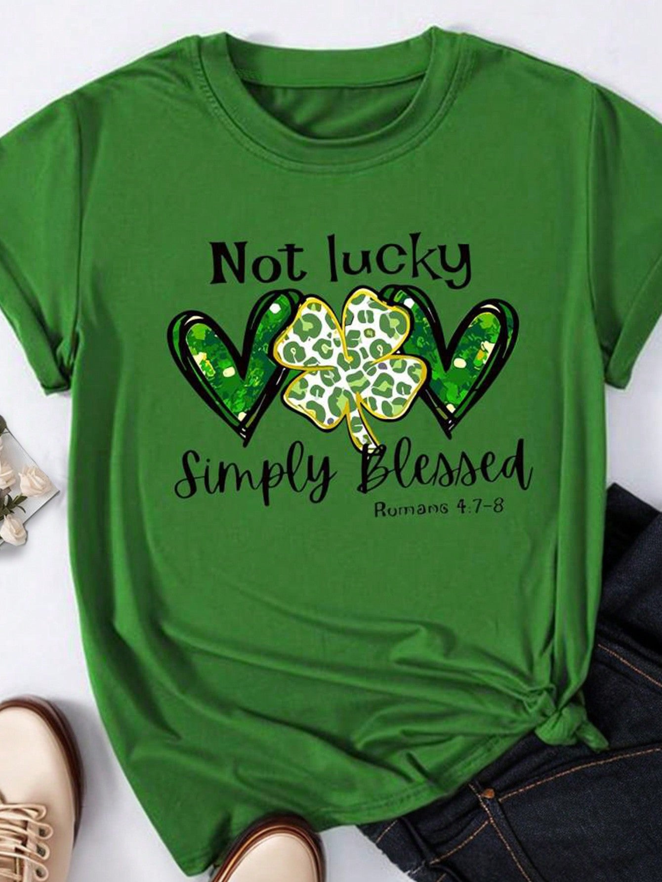 Get ready to rock your casual look with this Plus-Size Women's Heart & Clover Graphic Tee. With a playful heart and clover design, this casual round neck t-shirt will add a touch of quirkiness to your wardrobe. Perfect for both everyday wear and special occasions, this tee is sure to be your new favorite.