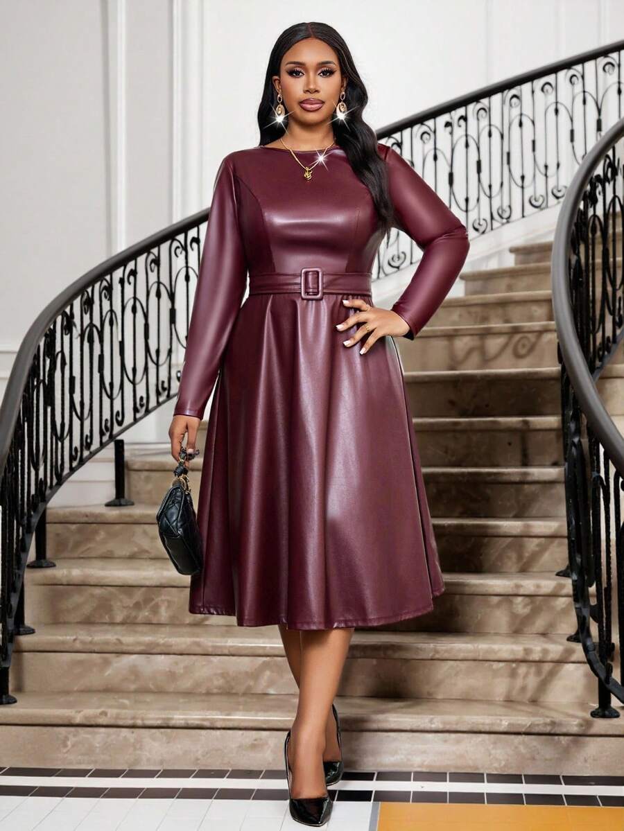Elevate your winter wardrobe with this stunning plus-size A-line belted dress that effortlessly combines sophistication with sass. The rich wine and black color combo is giving timeless elegance, while the cinched waist belt creates a flattering silhouette that celebrates your curves. Perfect for holiday parties, date nights, or whenever you want to feel absolutely fabulous. This versatile piece transitions seamlessly from day to evening, proving that chic never goes out of style—no matter the season or siz