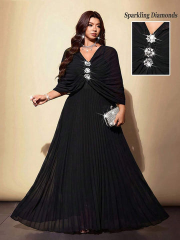 Shop a plus size black chiffon pleated dress with rhinestone accents. Perfect for parties, weddings, cocktail events, dinners, holidays, and special occasions.