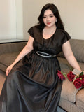Turn heads this summer with this playful plus size black chiffon dress! Lightweight chiffon and a ruffle collar add flirty charm, while the cinched waist flatters your curves perfectly. Short sleeves keep you cool and comfy, making it your go-to for sunny days and breezy nights.