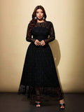 Front view of plus size black lace maxi dress with sheer round neckline and ruched waist