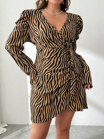 Make a bold statement in this plus-size zebra print wrap dress that effortlessly transitions from the office to festival season. The striking black and white pattern commands attention while the flattering cross-wrap silhouette hugs curves in all the right places. Versatile enough for professional settings yet fun enough for weekend adventures, this dress proves you don't have to choose between style and comfort. Dress it up with heels or down with sneakers—this wild print works with everything.