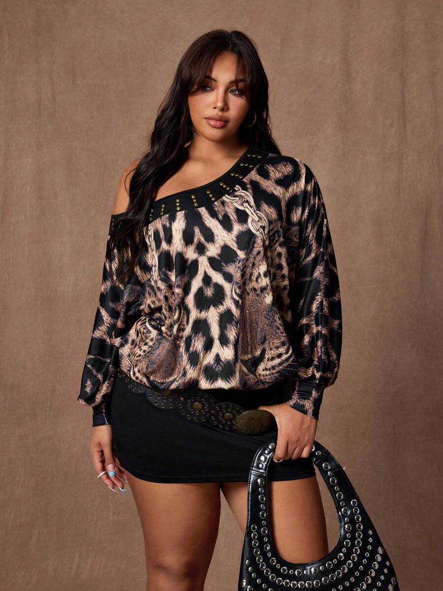 Unleash your wild side this season with our show-stopping wrap dress! Featuring a chic one-shoulder design and luxe bronze rivets, this piece transforms the classic leopard print into something utterly sophisticated. The flowing long sleeves and flattering wrap silhouette work beautifully for plus-size figures, while the rich brown tones make it perfect for autumn and winter styling. Whether you're heading to brunch or a night out, this dress proves that elegance and attitude go hand in paw together.