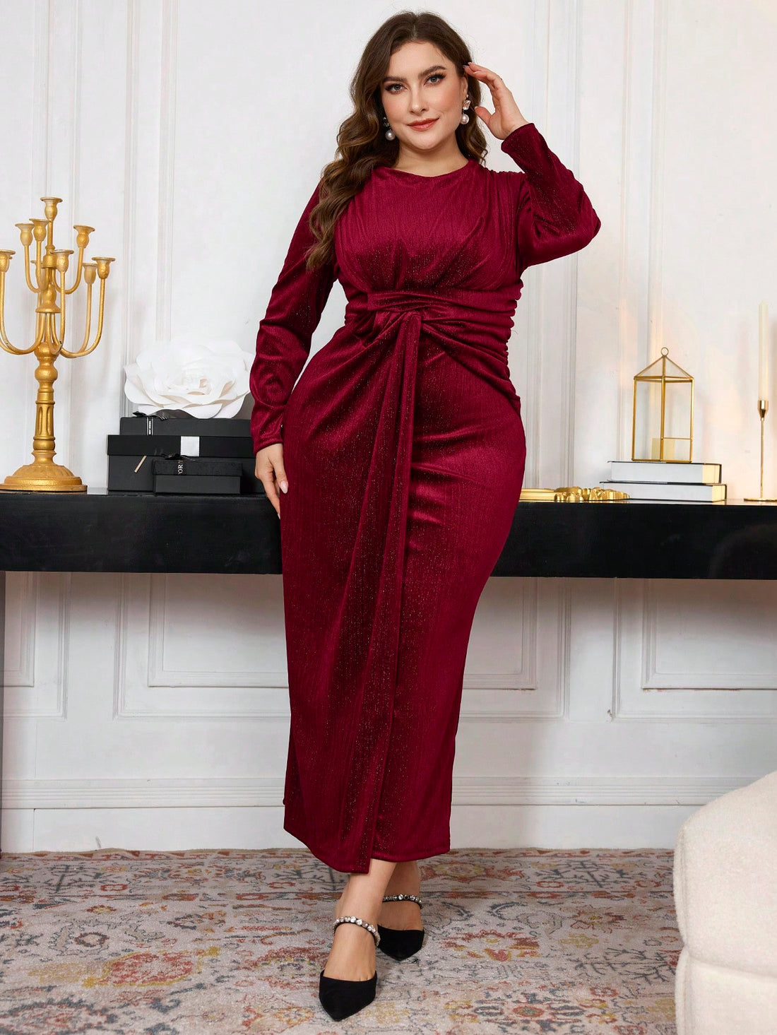 Step into cozy charm with this Plus Size Burgundy Red Twist Knit Midi Dress. Its flattering twist detail and fitted silhouette highlight your curves while long sleeves keep you comfy on crisp spring and autumn days. Perfect for fun outings or casual gatherings, this dress blends style and warmth in one effortlessly chic package.