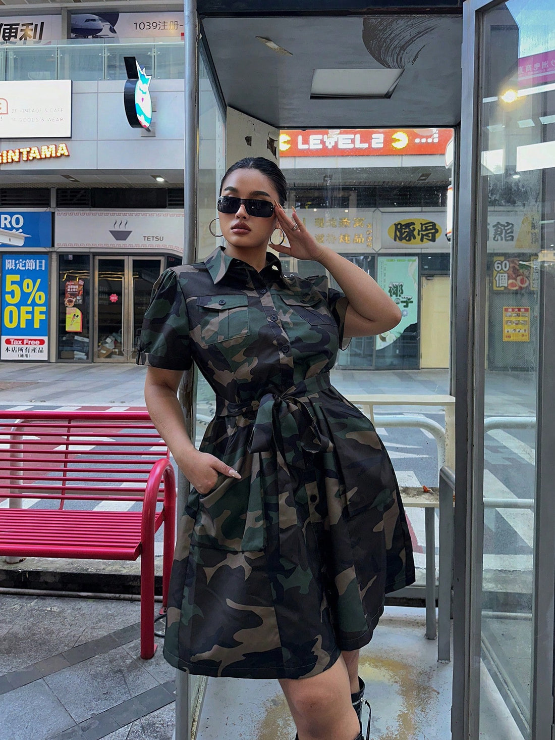 Upgrade your summer style with this playful Plus Size Camo Print Sleeveless Dress! Not only does it boast a trendy camo print, but it also comes with a stylish belt and convenient pockets. Perfect for achieving a chic and fun look.