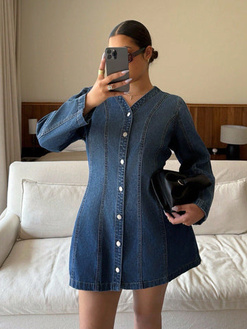 Slip into effortless style with this plus-size denim dress that goes everywhere you do. The classic front button design offers easy layering and a flattering fit, while the relaxed silhouette keeps you comfortable from morning commute to evening plans. Whether you're heading to work, catching a flight, or dancing at a party, this versatile wardrobe staple delivers timeless appeal with a modern edge. Dress it up with heels or keep it casual with sneakers—this denim essential adapts to your vibe and your sche