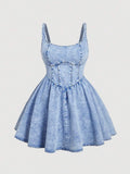Front view of light wash denim cami mini dress with flared skirt