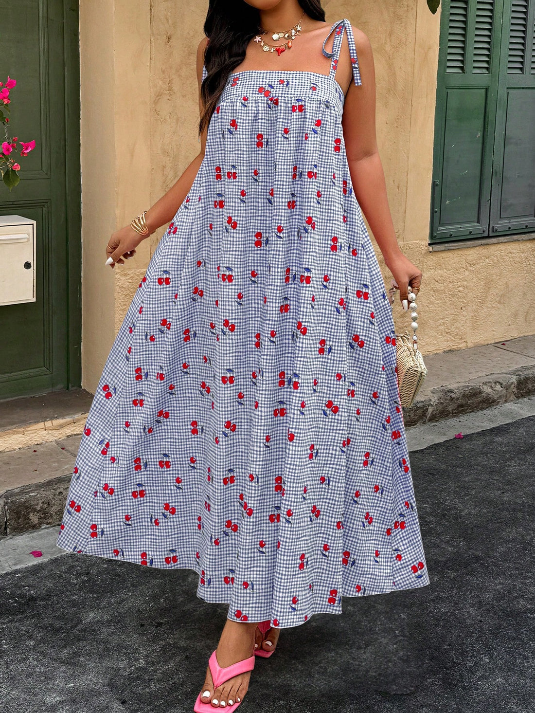 Embrace sunny days in this playful plus size cherry plaid dress, perfect for your summer escapes. Its loose fit and adjustable straps keep you comfy and cool, while the vibrant cherry plaid adds a fun, flirty touch. Ideal for beach strolls or casual outings, this dress brings effortless style to your vacation wardrobe.
