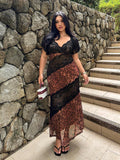 Full front view of brown leopard-print lace-band dress styled outdoors on stone steps