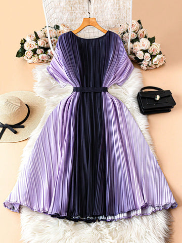 Step into summer with this playful plus size dress featuring a vibrant colorblock gradient that effortlessly catches every eye. The breezy batwing sleeves add a fun, relaxed vibe, perfect for sunny days and casual outings. Designed to keep you cool and comfortable, this dress is your go-to for easy, stylish summer moments.