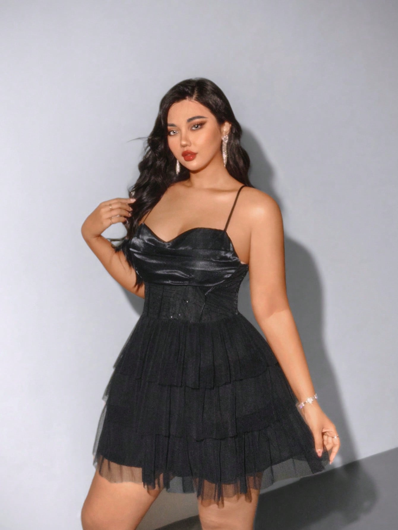 Turn heads at every rave and Coachella with this Plus Size Dark Sequin Punk Cami Dress. Sparkling sequins catch the light while the edgy punk design keeps your look bold and fun. Comfortable and flattering, it’s perfect for dancing all night and making unforgettable festival memories.