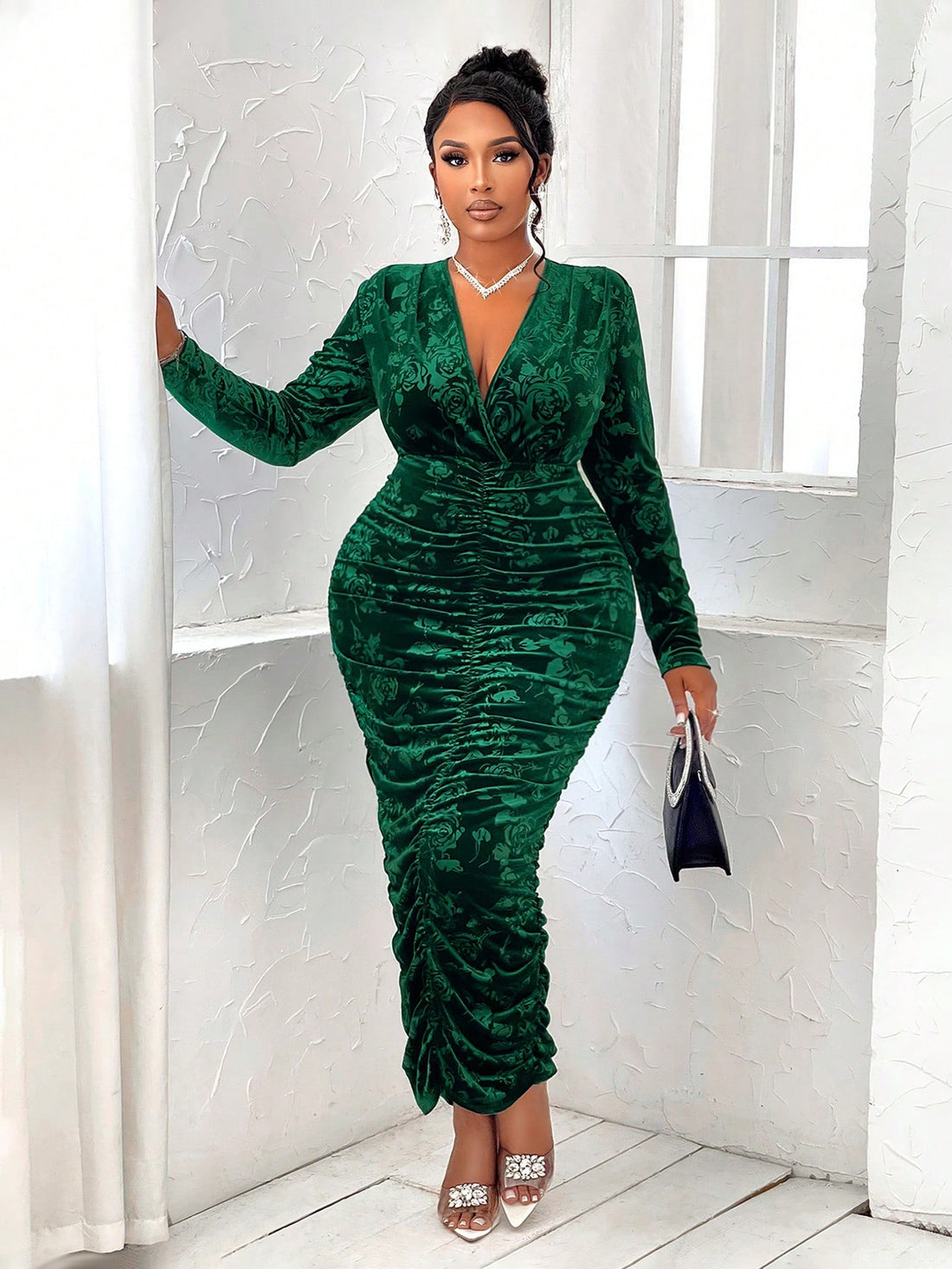 Make a statement in this plus-size jacquard dress that's equal parts spooky-season chic and everyday fabulous. The plunging V-neckline flatters your silhouette while the intricate jacquard fabric adds texture and visual interest. Whether you're hitting Halloween parties or elevating your regular wardrobe, this versatile piece delivers confidence and style. The generous sizing ensures comfort without compromising on that head-turning elegance you deserve.