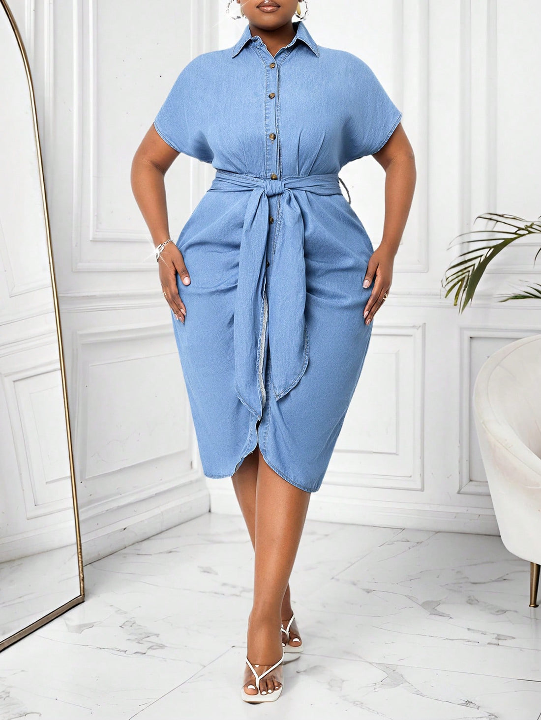 Get ready for summer in a fun and flirty way with our Plus Size Denim Midi Dress! Made with short sleeves and a fitted design, this dress is perfect for any casual occasion. Stay cool and stylish all season long with this must-have addition to your wardrobe.
