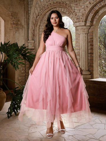 Embrace soft, romantic style with this plus size dusty pink asymmetric dress, designed for elegant summer occasions and effortless vacation dressing. The muted pink hue creates a feminine, sophisticated look, while the asymmetric silhouette adds a modern touch and graceful movement. Designed with a flattering plus size fit, this dress is easy to wear for summer weddings, wedding guest events, beach vacations, resort dinners, garden parties, brunches, and special celebrations. 