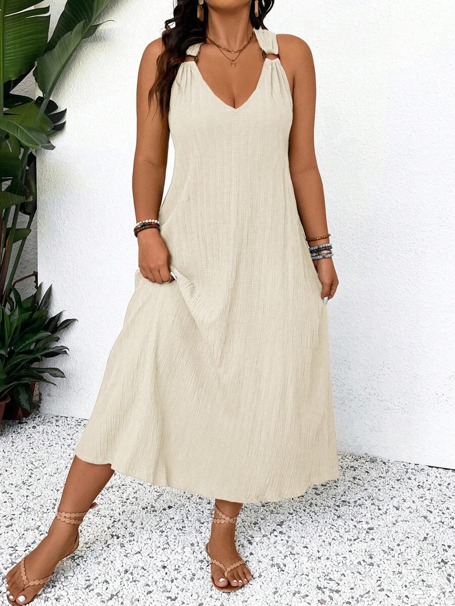Step into effortless style with the Plus Size Elaquor Solid Tank Dress, featuring a chic ring detail that adds a fun twist to your look. This dress combines comfort and flair, making it perfect for any casual outing or spontaneous adventure. Flattering and easy to wear, it’s your new go-to for turning heads with a playful touch.