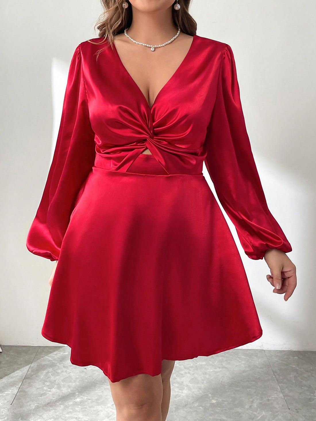 Turn heads on your next date or concert night with this playful plus size V-neck satin dress. The front twist adds a flirty touch, while the pleated hem creates fun movement as you walk. Crafted for comfort and style, it’s the perfect blend of elegant charm and easygoing flair for your on-the-go wardrobe.