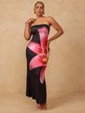Step into summer with this Plus Size Elegant Floral Strapless Dress that blends comfort and charm. Its flirty strapless design lets you soak up the sun with ease, while the vibrant floral pattern adds a playful splash of color. Perfect for effortless style at any sunny occasion, this dress celebrates your curves and keeps you looking fresh all day long. Ready to twirl through warm days with confidence? This dress has got you covered!