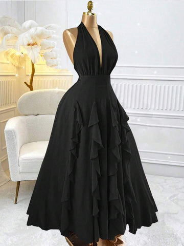 Step into the spotlight with this playful plus size halter dress, featuring a charming bowknot and flirty ruffle hem. Perfect for vacations or parties, it combines comfort and style effortlessly, letting you dance, twirl, and shine all day long. Embrace your curves with a dress that’s as fun as you are!