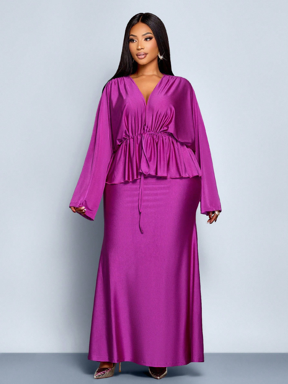 Make a statement at your next autumn or spring celebration in this stunning two-piece set designed for curves and confidence. The dramatic bat sleeves add a touch of flair and movement, while the fishtail skirt creates an elegant silhouette that turns heads. Crafted for plus-size figures, this ensemble combines comfort with sophisticated style, perfect for parties, dinners, or any special occasion where you want to feel absolutely fabulous. Embrace your inner fashionista and own the room!