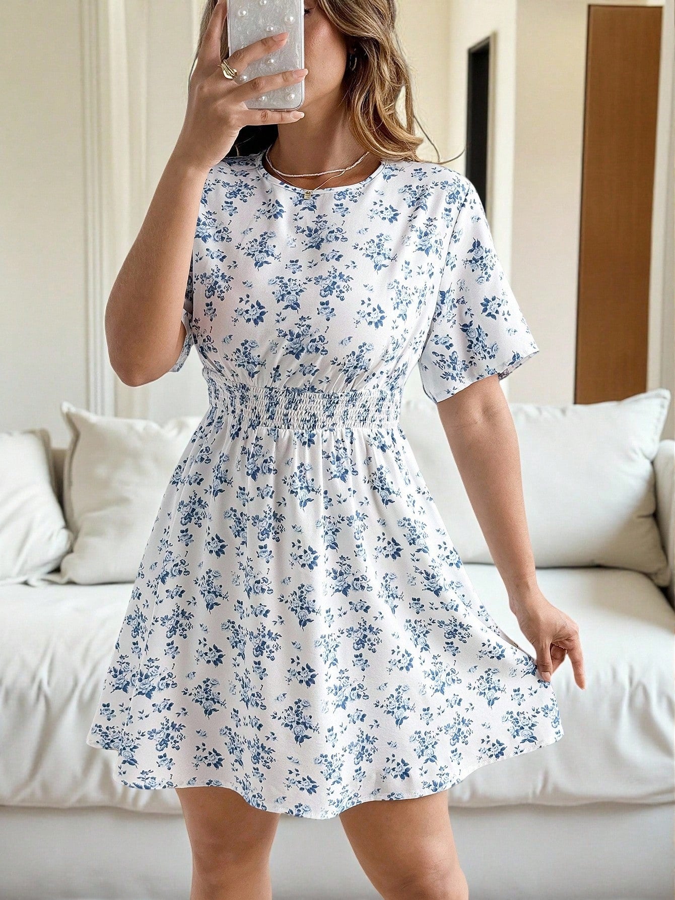 Step into summer with this playful plus size French vacation dress, featuring a charming ditsy floral pattern in breezy blue and white. Perfect for casual outings or beach days, it offers a comfortable fit that moves with you, keeping your look effortlessly chic while you soak up the sun. Embrace the carefree spirit of summer in style!