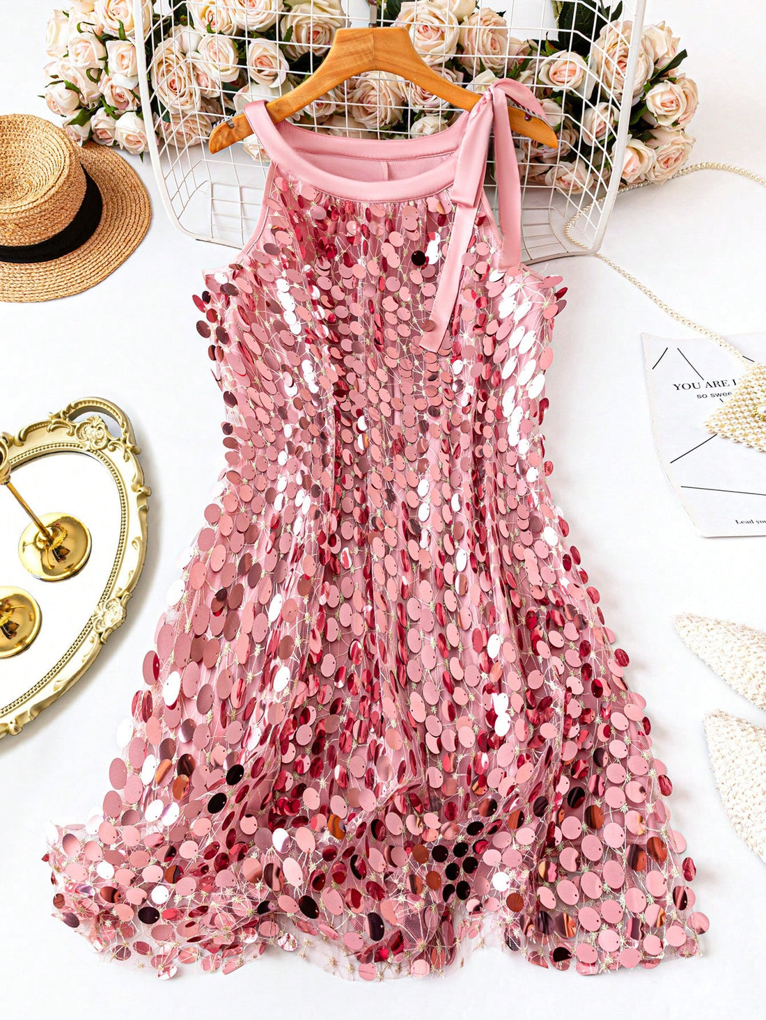 Turn heads at every birthday bash with this Plus Size Halter Neck Midi Dress. Its sparkling sequins and flattering halter neckline bring playful elegance to your summer celebrations. Designed to hug your curves comfortably while keeping you cool, this dress makes party-perfect style effortless. Get ready to shine and dance the night away!