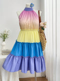 Celebrate the season in style with this playful plus size holiday dress featuring vibrant color blocks and charming ruffle trim. The tie waist adds a flattering touch, creating a silhouette that’s both comfortable and chic. Perfect for casual gatherings or festive fun, this dress brings effortless elegance to your holiday wardrobe.