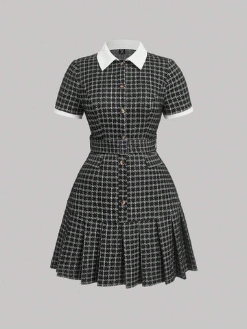 Front view of black check polo collar belted pleated shirt dress