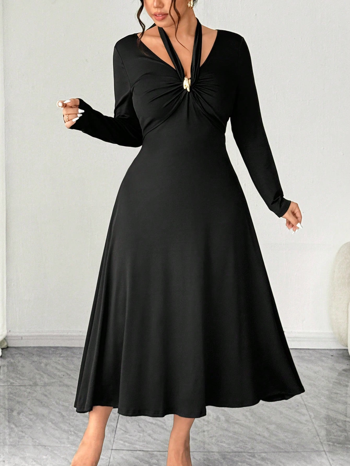 Embrace effortless elegance with this plus-size knit dress that's basically a hug from your closet. The flattering V-neckline and strategic ruching create a silhouette that feels as good as it looks, while the tie-front detail adds a playful twist. Crafted in soft, cozy knit fabric perfect for autumn and winter, this solid-color stunner transitions seamlessly from casual coffee dates to dinner plans. It's the dress that makes you feel confident, comfortable, and undeniably chic—no complicated styling requir