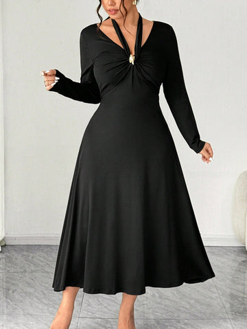 Embrace effortless elegance with this plus-size knit dress that's basically a hug from your closet. The flattering V-neckline and strategic ruching create a silhouette that feels as good as it looks, while the tie-front detail adds a playful twist. Crafted in soft, cozy knit fabric perfect for autumn and winter, this solid-color stunner transitions seamlessly from casual coffee dates to dinner plans. It's the dress that makes you feel confident, comfortable, and undeniably chic—no complicated styling requir