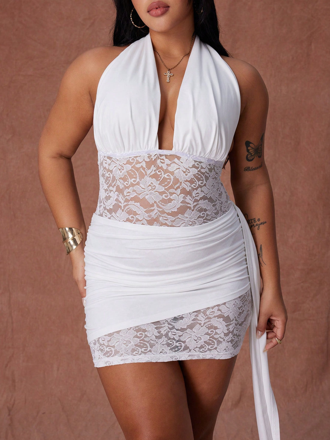 Slip into sophistication with this stunning plus-size midi dress that's equal parts elegance and allure. Crafted from delicate lace in a timeless solid hue, it features a flattering bodycon silhouette that celebrates your curves while the sheer long sleeves add an irresistible touch of mystery. Perfect for autumn and winter gatherings, this dress transitions seamlessly from cocktail parties to special occasions. The midi length keeps things classy while the see-through details whisper just enough sass to tu