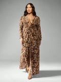 Turn heads this fall and winter in this flirty plus size leopard print maxi dress! Featuring a playful twist front and a daring plunge neckline, it's perfect for making a bold