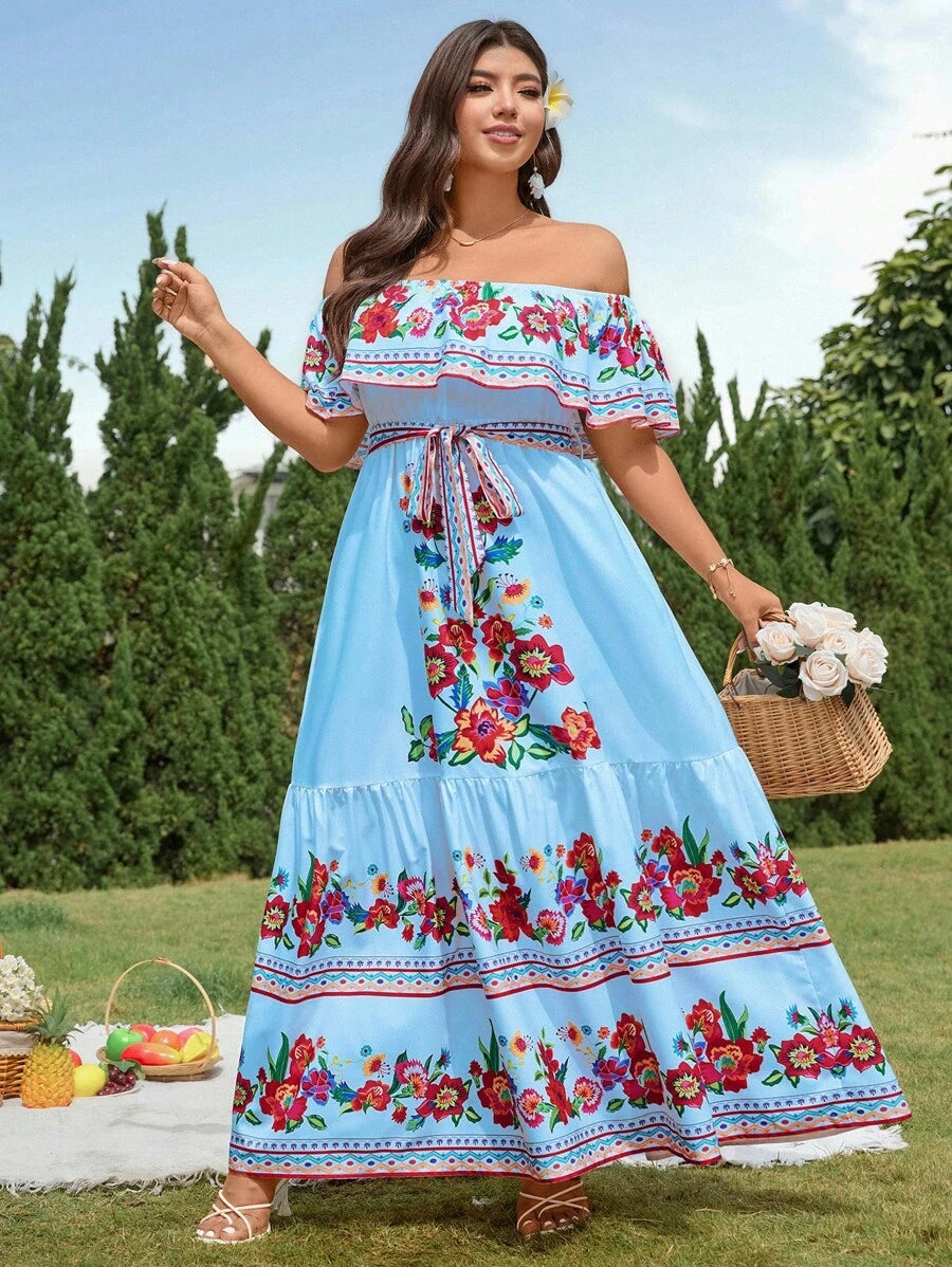 Embrace your curves and the sunshine in this playful plus size off-shoulder floral maxi dress. Its breezy A-line cut flows gracefully with every step, making it perfect for holiday adventures or garden parties. The vibrant floral pattern adds a splash of fun, while the off-shoulder design keeps things flirty and fresh all day long. Let your style bloom with effortless charm wherever you go!