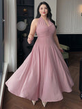 Turn heads this summer with our Plus Size Pink Chiffon Bodycon Halter Dress. Designed to hug your curves in all the right places, its lightweight chiffon fabric keeps you cool while adding a touch of flirty elegance. The halter neckline brings a playful vibe, perfect for sunny days and warm nights. Celebrate your style with comfort and confidence wherever you go!