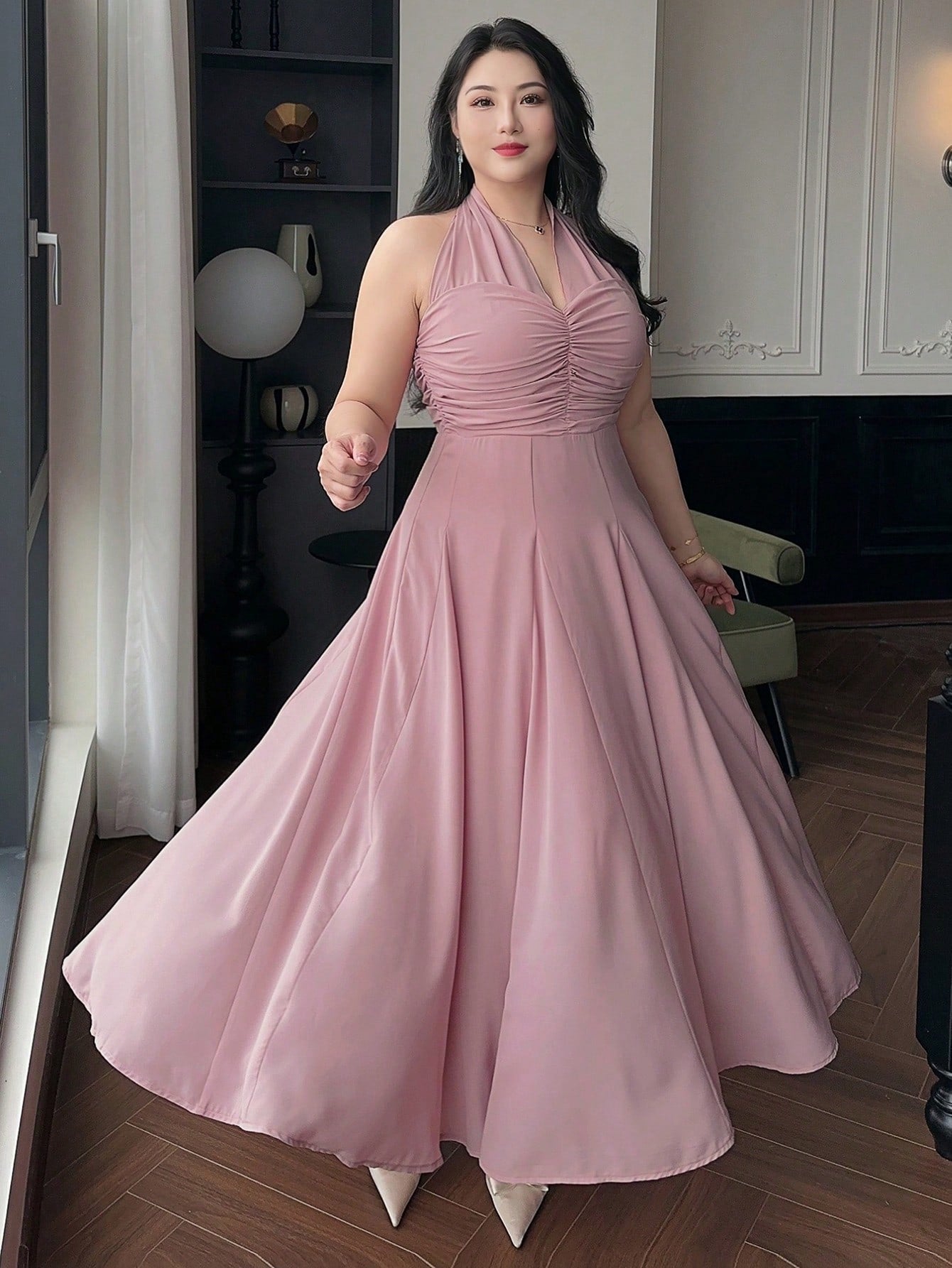 Turn heads this summer with our Plus Size Pink Chiffon Bodycon Halter Dress. Designed to hug your curves in all the right places, its lightweight chiffon fabric keeps you cool while adding a touch of flirty elegance. The halter neckline brings a playful vibe, perfect for sunny days and warm nights. Celebrate your style with comfort and confidence wherever you go!