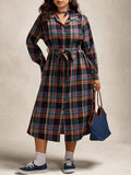 Step out in style and comfort with this Plus Size Plaid Button-Up Dress. Featuring a playful tie-waist that highlights your curves, its long sleeves and classic button-up design make it the perfect go-to for casual outings. Lightweight and easy to wear, this versatile dress brings a fun twist to plaid, ensuring you look effortlessly chic all day long.