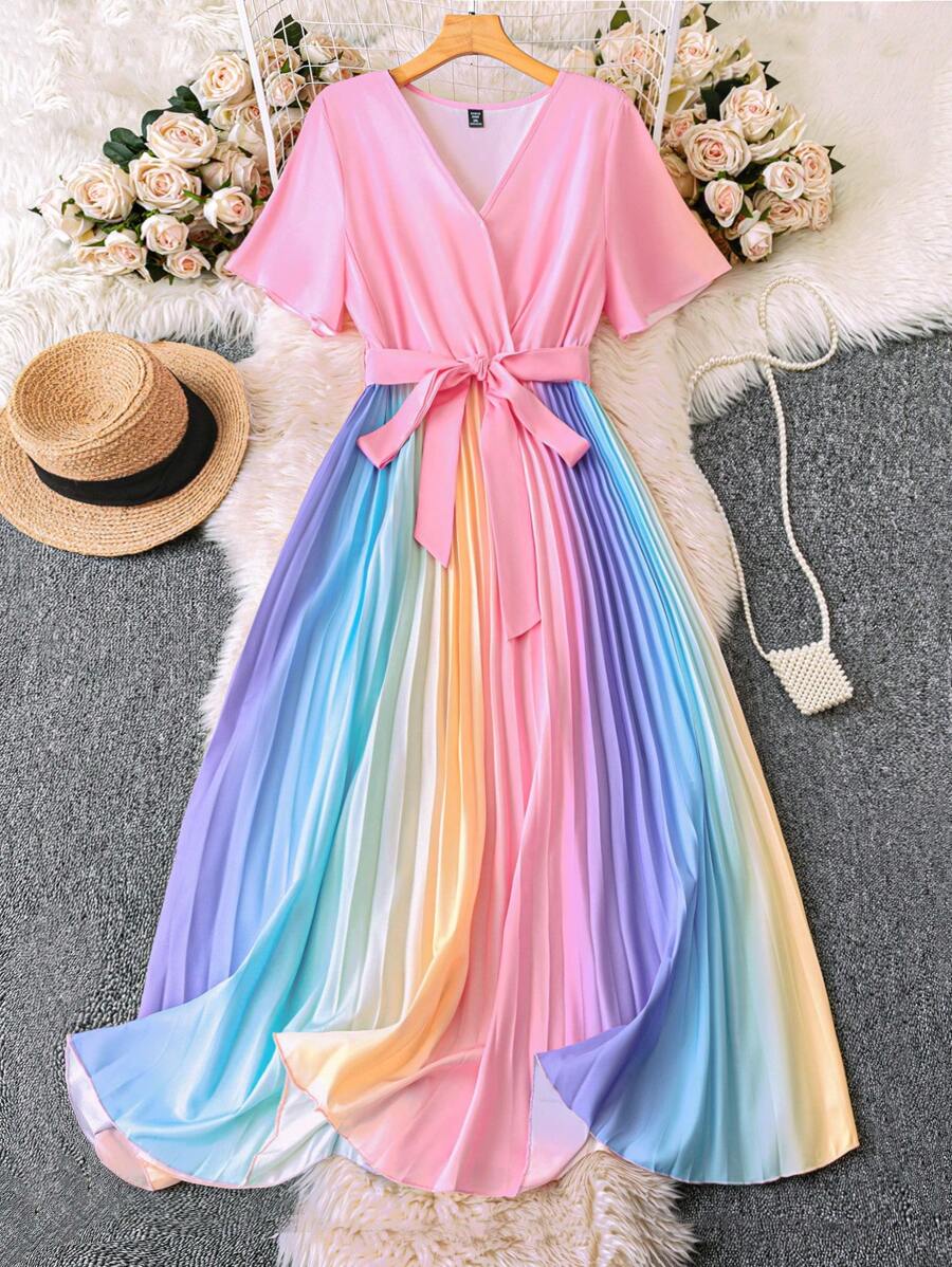 Radiate Joy and Confidence in Our Plus Size Rainbow Pleated Lantern Sleeve Dress!

Celebrate your most special moments in a burst of color and elegance. This vibrant rainbow masterpiece is thoughtfully designed to flatter every curve, making it the ultimate statement piece for milestones and sun-soaked getaways alike.

Vibrant Rainbow Pleats: The stunning multi-color pleated fabric creates a dynamic, high-fashion look that moves beautifully with every step, ensuring you’re the center of attention.

Flatteri