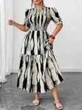 Elevate your wardrobe with this stunning plus-size midi dress that's equal parts sophisticated and fun. The striking black and white rendered print makes a bold statement, while romantic puff sleeves add a touch of whimsy. Strategic shirring through the bodice creates a flattering silhouette that hugs in all the right places. Perfect for date nights, brunch dates, or whenever you want to feel absolutely fabulous. This dress proves that elegance and playfulness go hand in hand.
